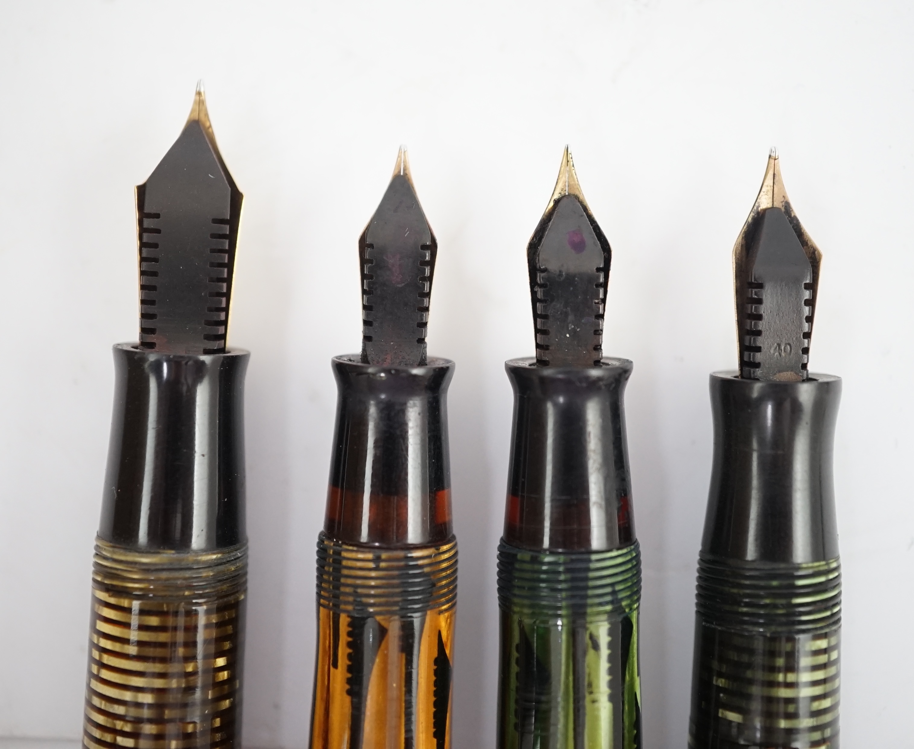 Four Parker pens to include an oversize Vacumatic